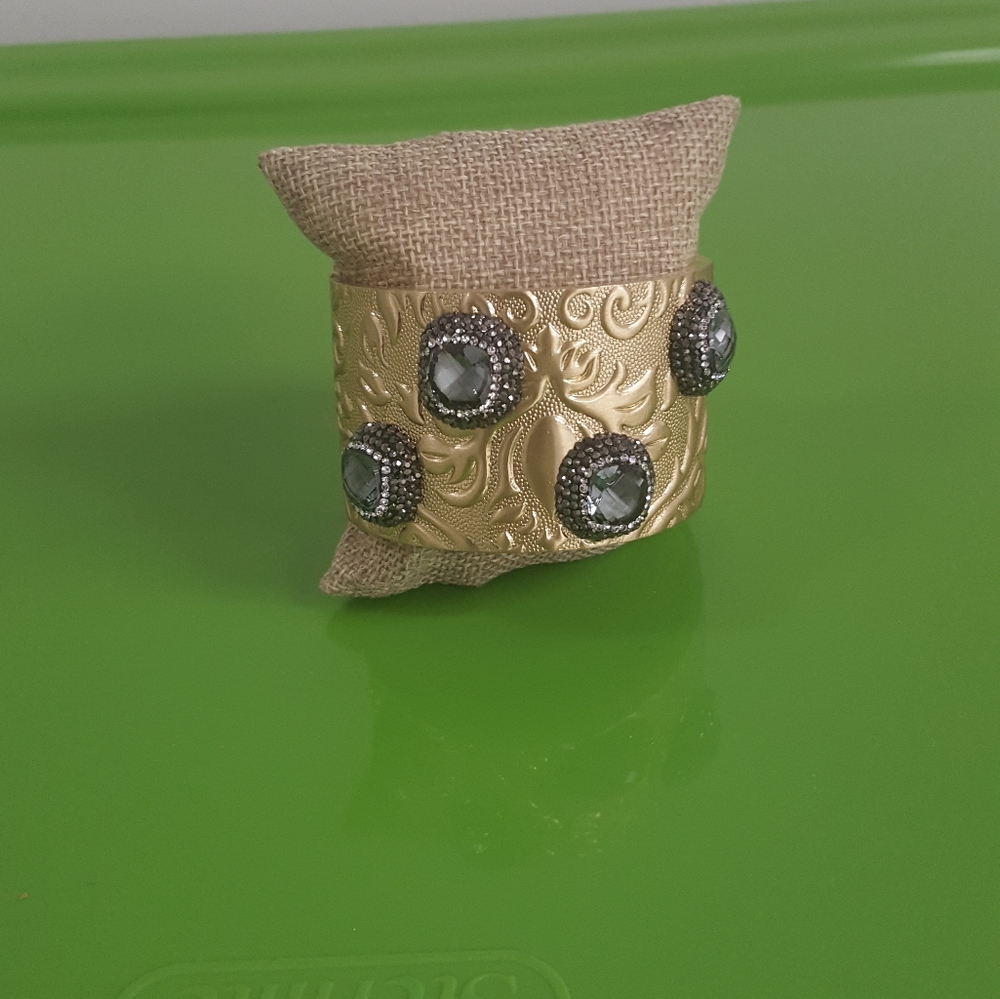 Gold Cuff with Droozy Stones.